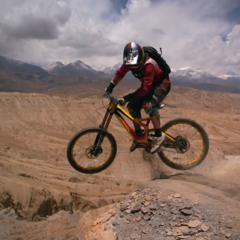 Mountain bikers hike through Nepal's Upper Mustang and China's Gobi De
