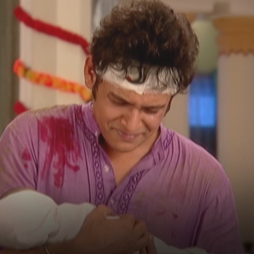 Sheekar finally returns home and holds his child for the first time, b