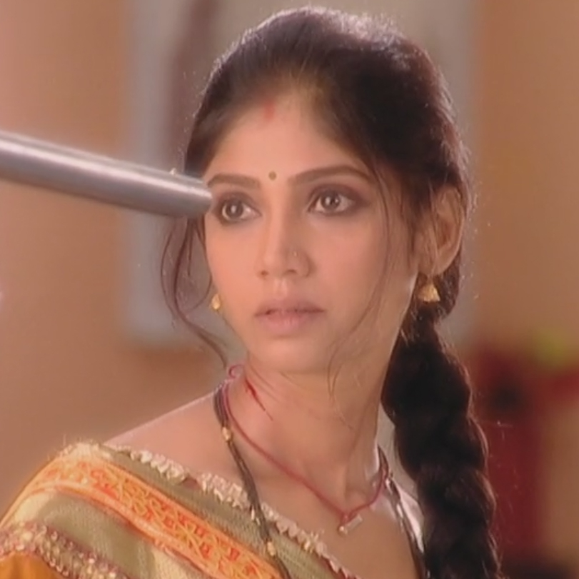 Luha chokes Laali intending to kill her and gets his rifle ready to sh