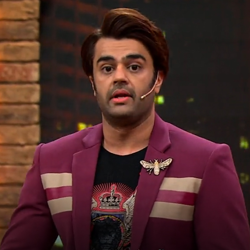 The host, Manish Paul, tests the contestants' love and passion for Bol